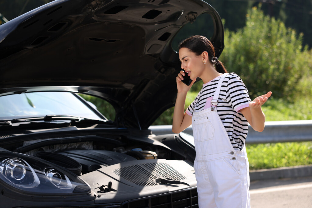 California driver reviewing repair orders with a lemon lawyer California case review.
